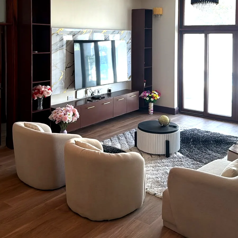 Villa living room with large windows and natural light