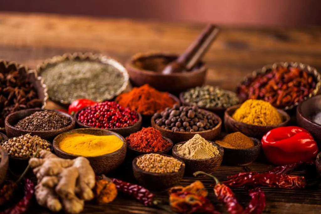 Bowls of whole and ground spices