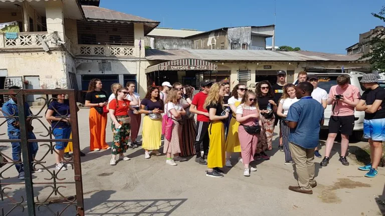 Tour group with a guide on a Stone Town walking tour